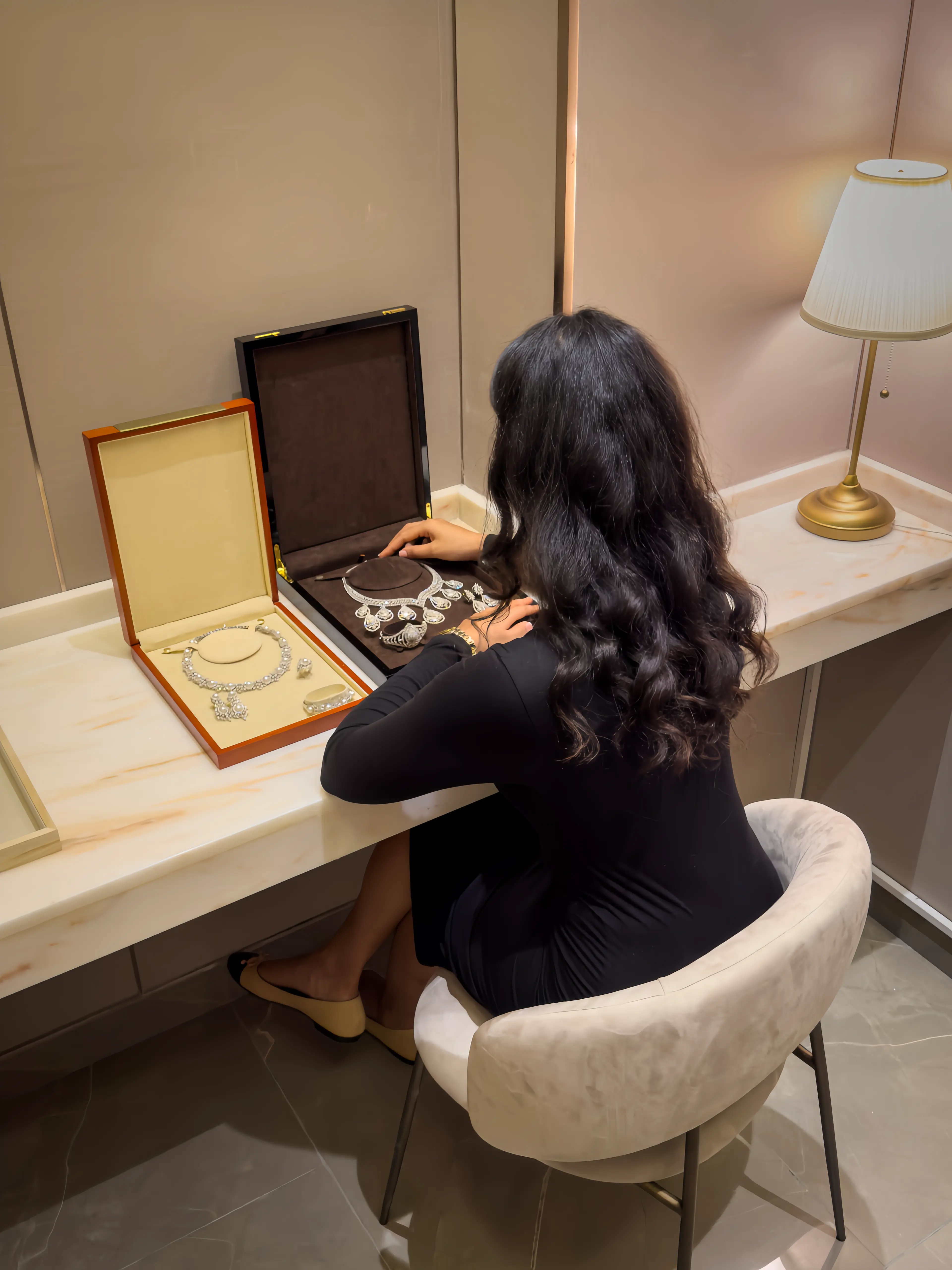 Woman at desk in private viewing room