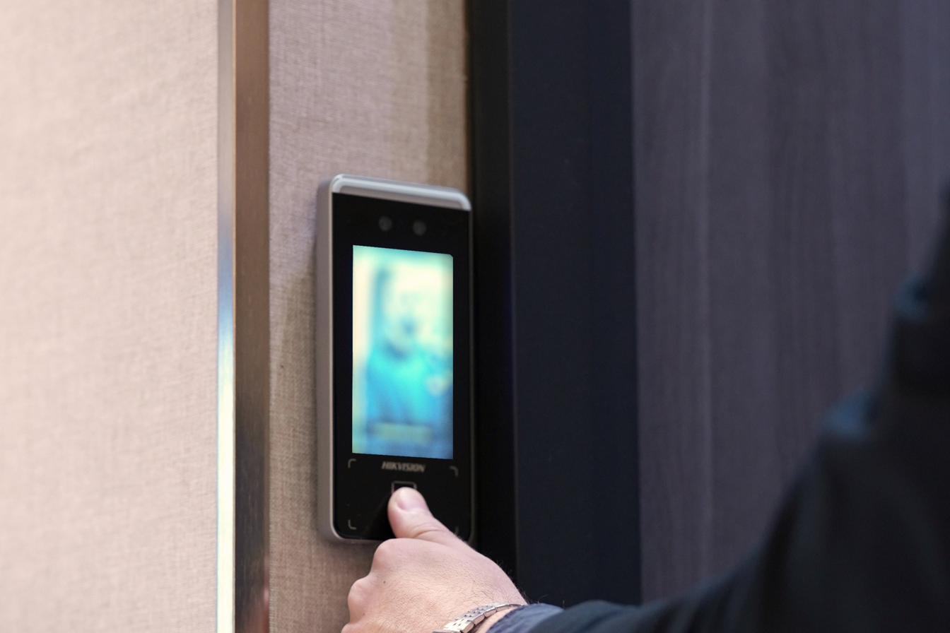 Fingerprint and facial-recognition scanner at the vault entrance